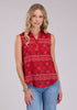 A woman wearing a red sleeveless shirt with a geometric pattern, paired with blue jeans.