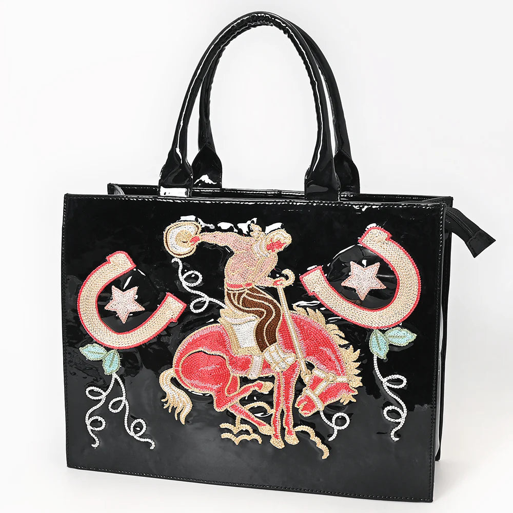 Black handbag with embroidered design of a cowboy on a horse, horseshoes, and stars.