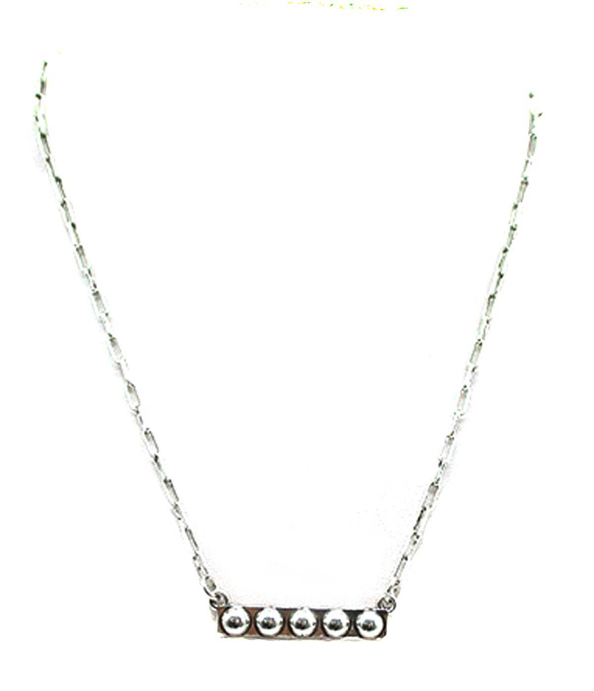 Silver necklace with a bar pendant on a white background