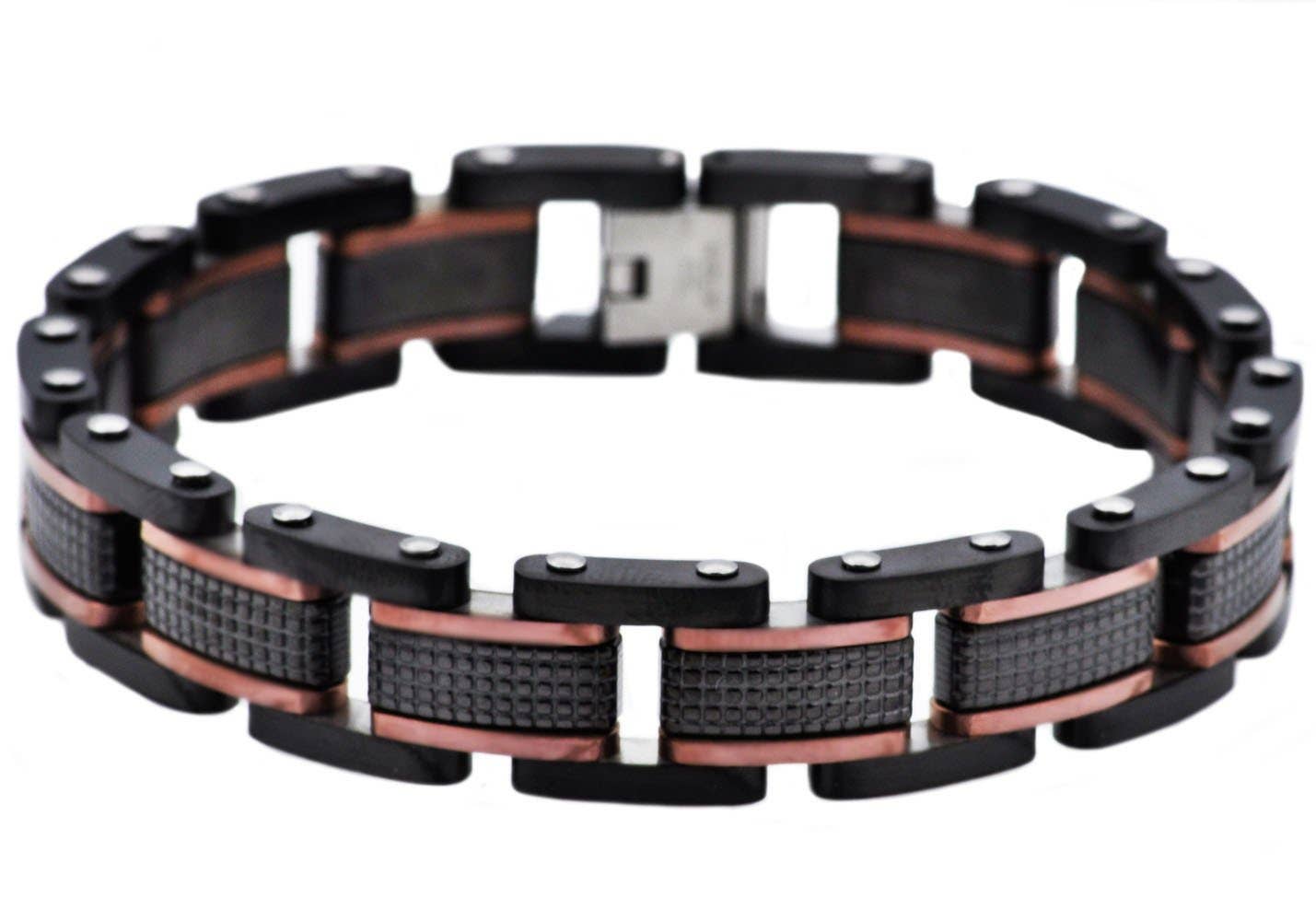 Black and red metal bracelet on a white background