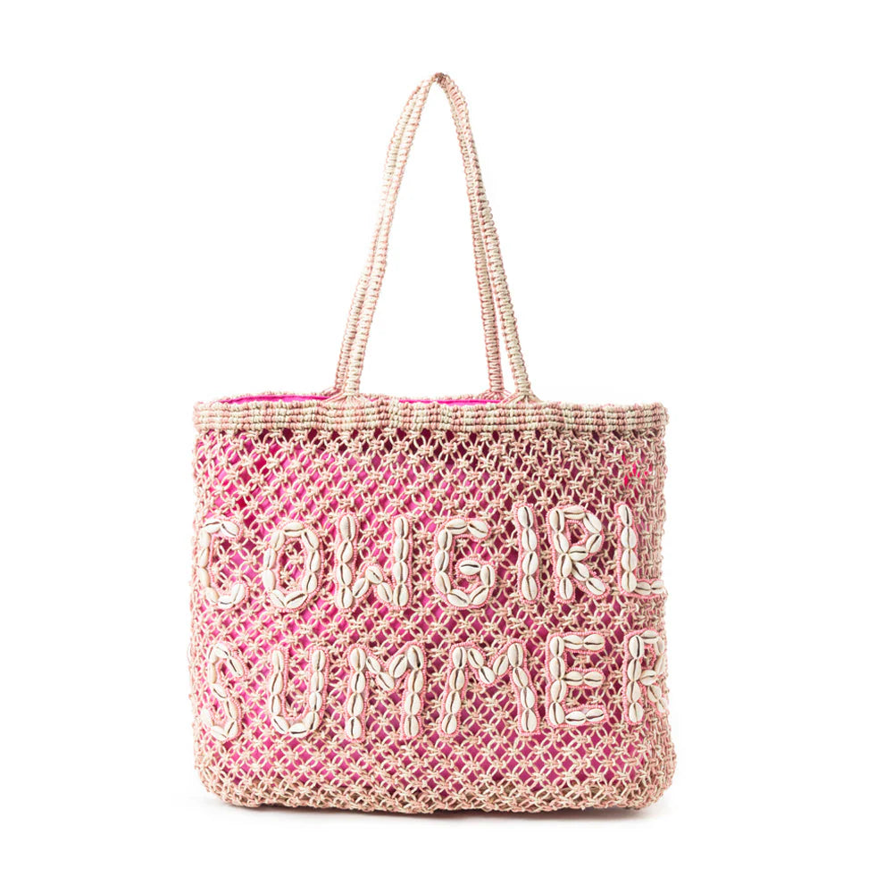 S-11764 Cowgirl Summer Tote featuring a handwoven rug and canvas design with "COWGIRL SUMMER" spelled in cowrie shells. Spacious with a vibrant pink lining, sturdy handles, and interior pockets for storage.