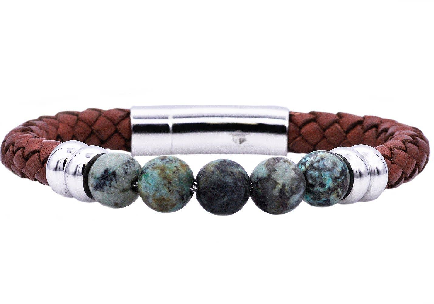 Bracelet with brown leather strap, turquoise beads, and silver clasp on a white background