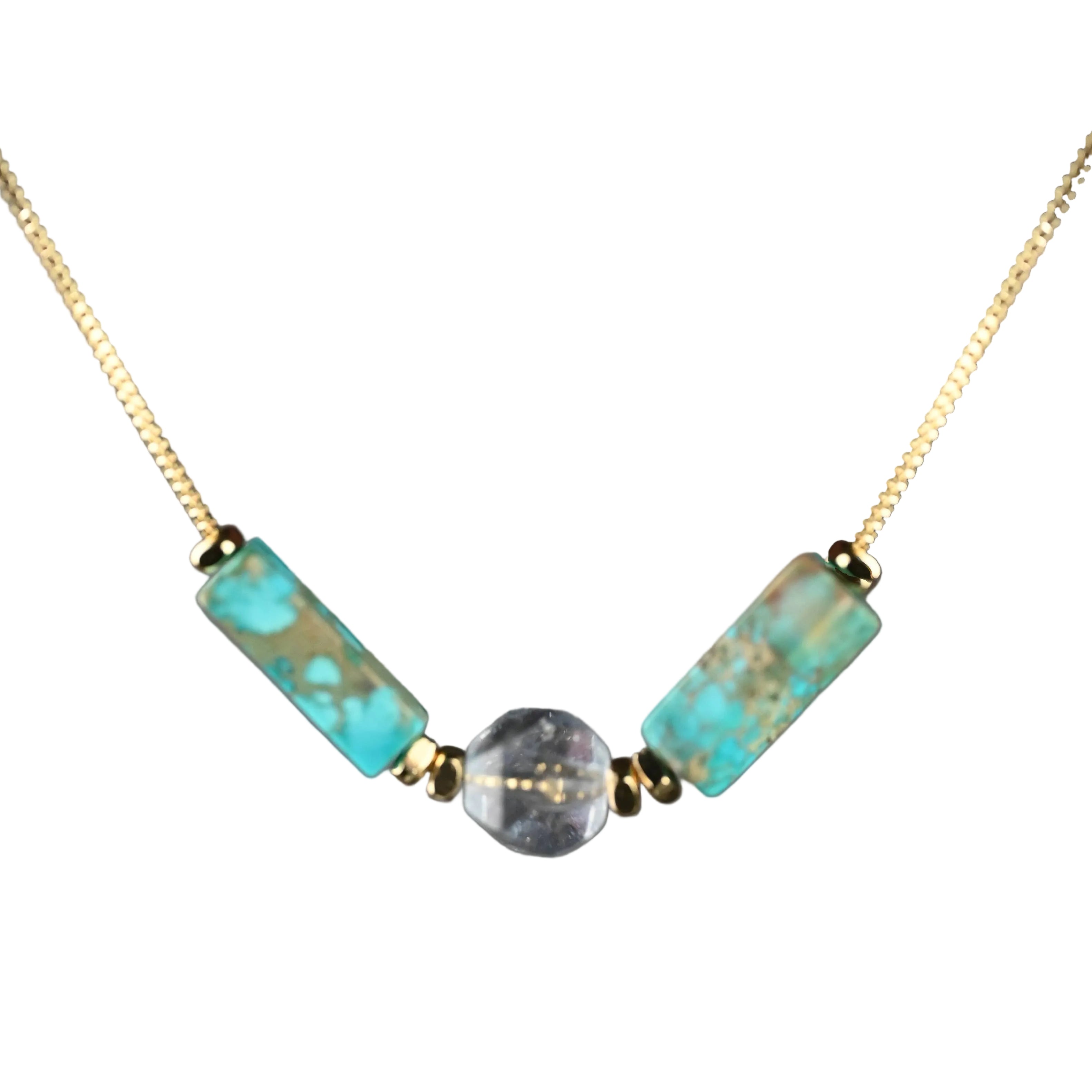 Necklace with turquoise beads and a clear crystal