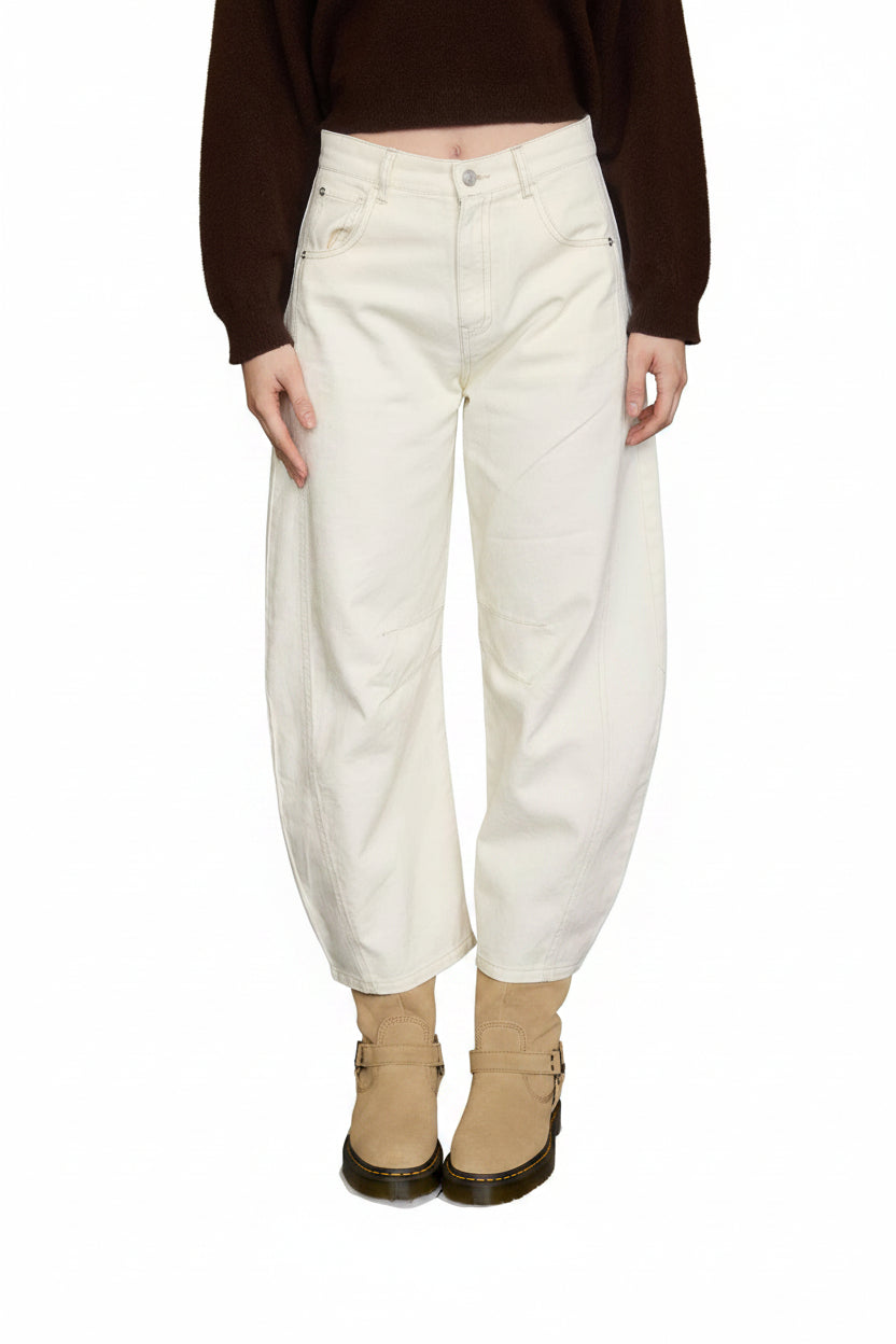 Cream high-waist barrel jeans with wide cropped leg, panel detail, and structured fit
