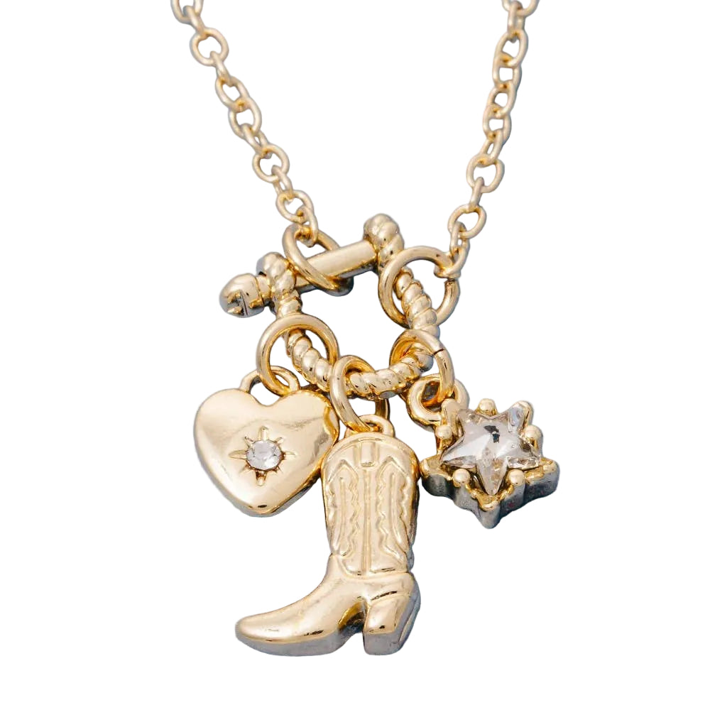 Gold necklace with cowboy boot, heart, and star charms on a light blue background