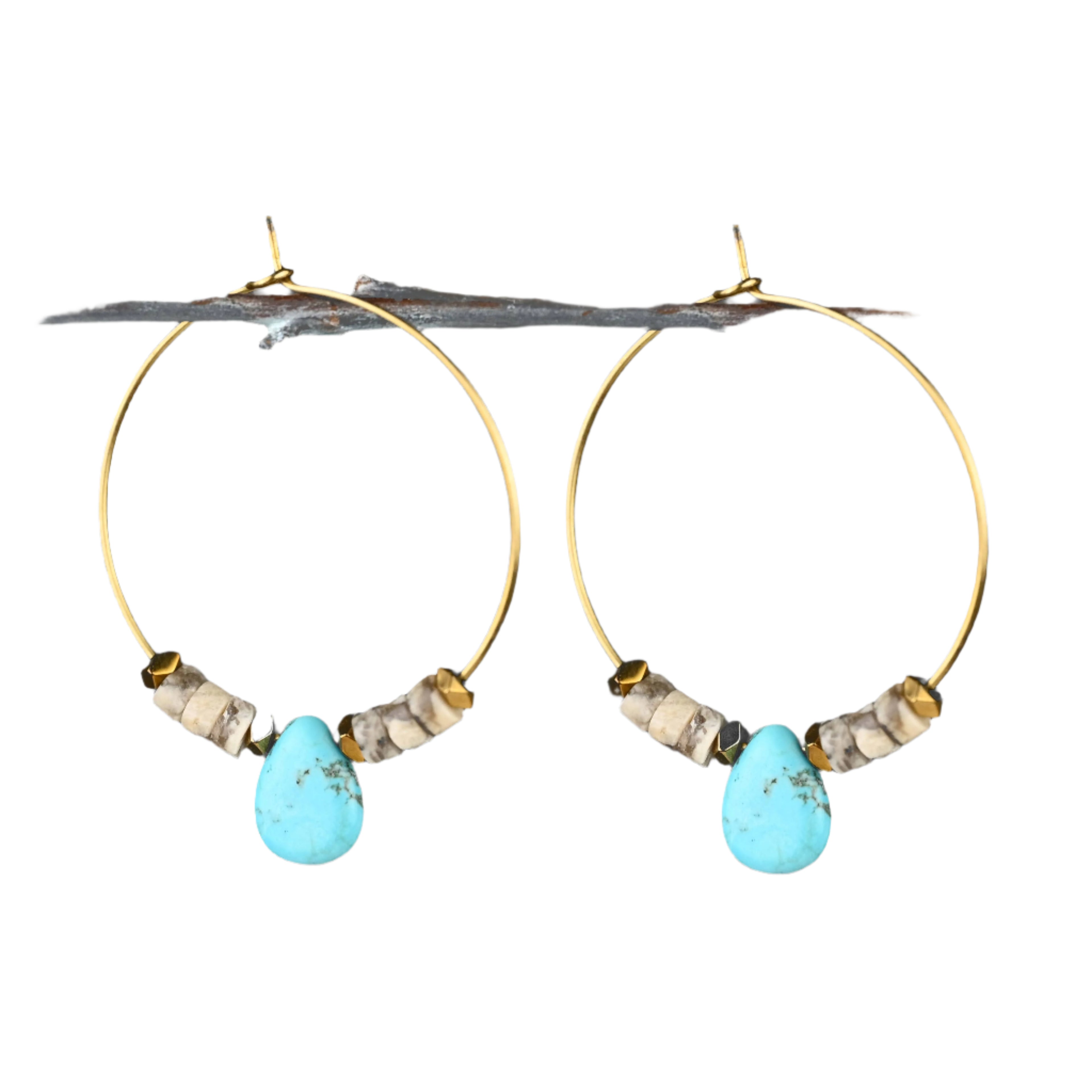 Handmade Desert Oasis Hoops featuring vibrant turquoise stones on brass hoops, approximately 1.5 inches in size.