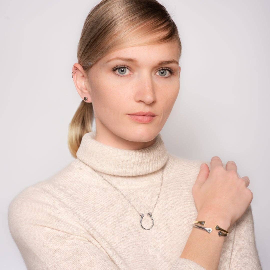 Charmed Horseshoe Nail Bracelet