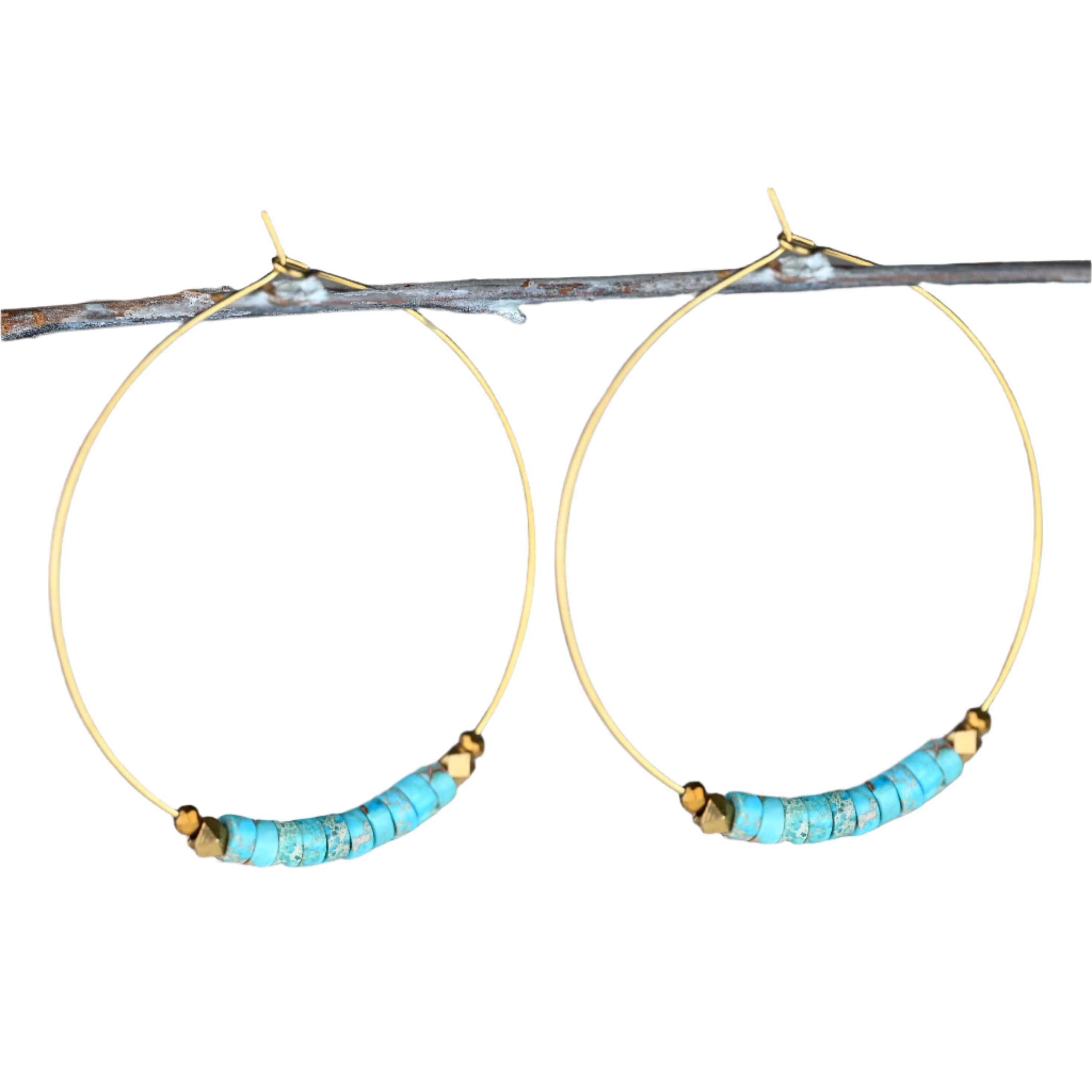 Rio Verde Hoop Earrings featuring turquoise-colored Jasper beads accented with tiny gold crystals on brass hoops.
