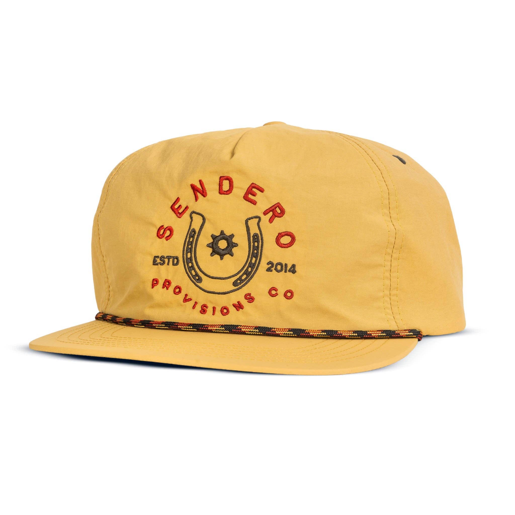 Mustard yellow rope hat featuring an embroidered Sendero Provisions Co. horseshoe logo with red lettering and vintage-inspired detailing. Designed with a flat brim and decorative rope accent for a classic Western look. Adjustable fit.