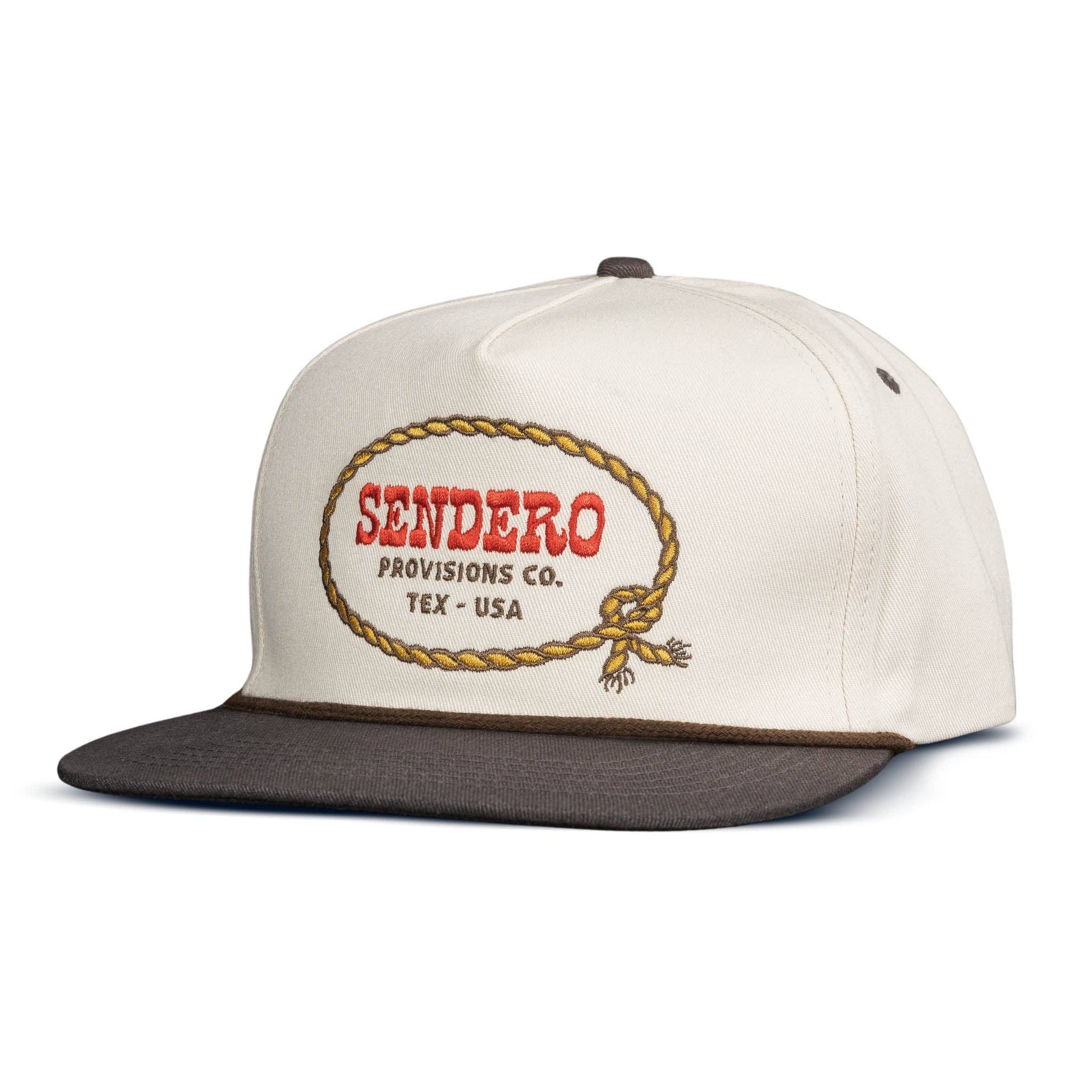 Cream and brown rope hat featuring an embroidered Sendero Provisions Co. logo inside a lasso rope design. Classic Western-inspired style with a structured front panel, flat brim, and decorative rope accent. Adjustable fit.