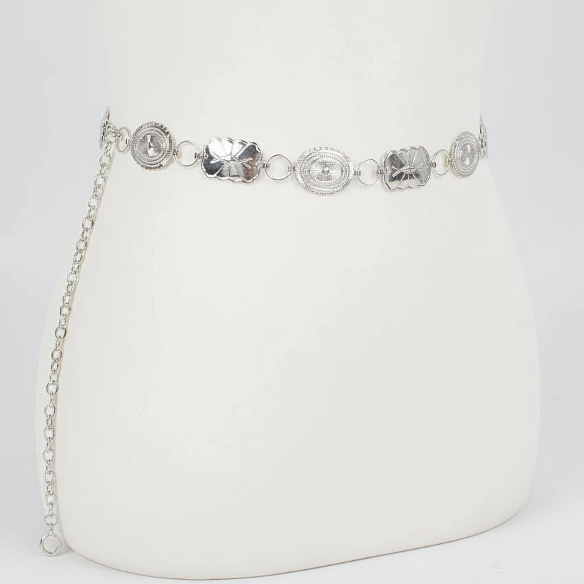 Silver western concho chain belt with linked metal plates and adjustable fit for styling over dresses or denim
