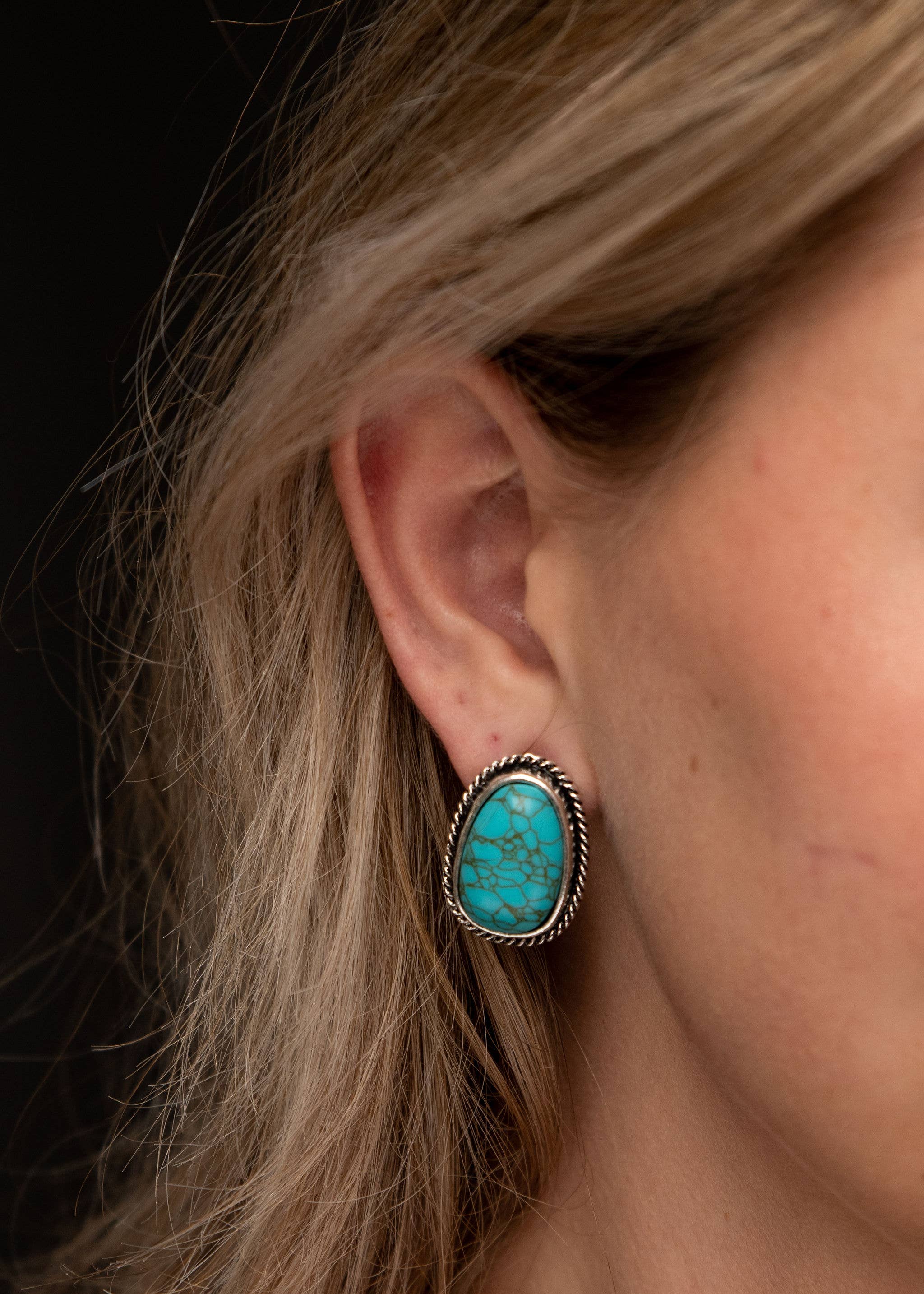 Sonoran Stone Earrings featuring vibrant turquoise stones framed with intricate burnished silver rope detailing, showcasing timeless Southwestern elegance