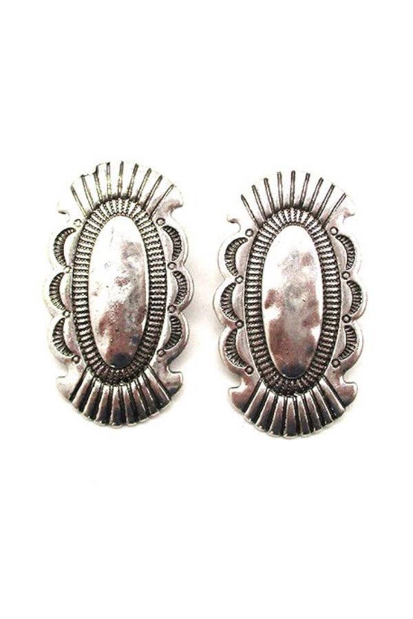 Pair of silver earrings with intricate designs on a white background
