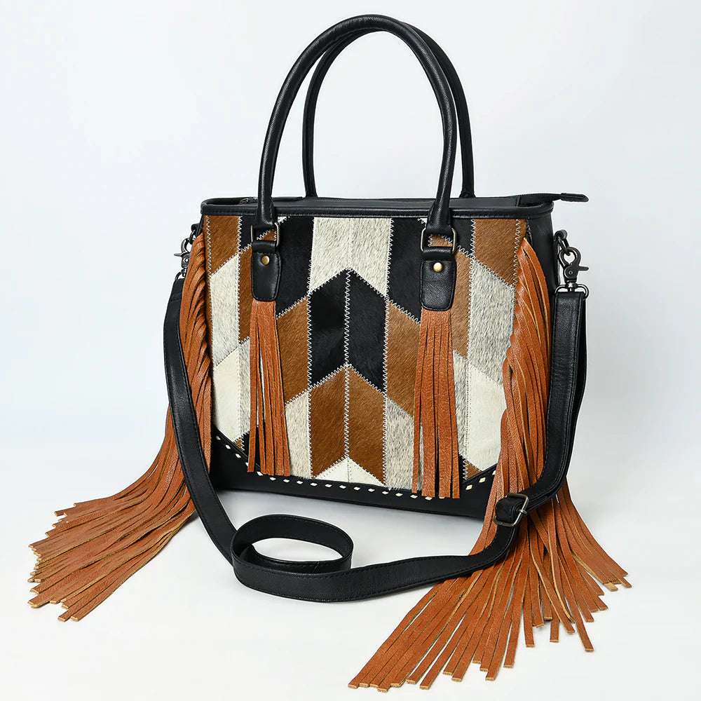 Handbag with geometric pattern and fringes on a white background