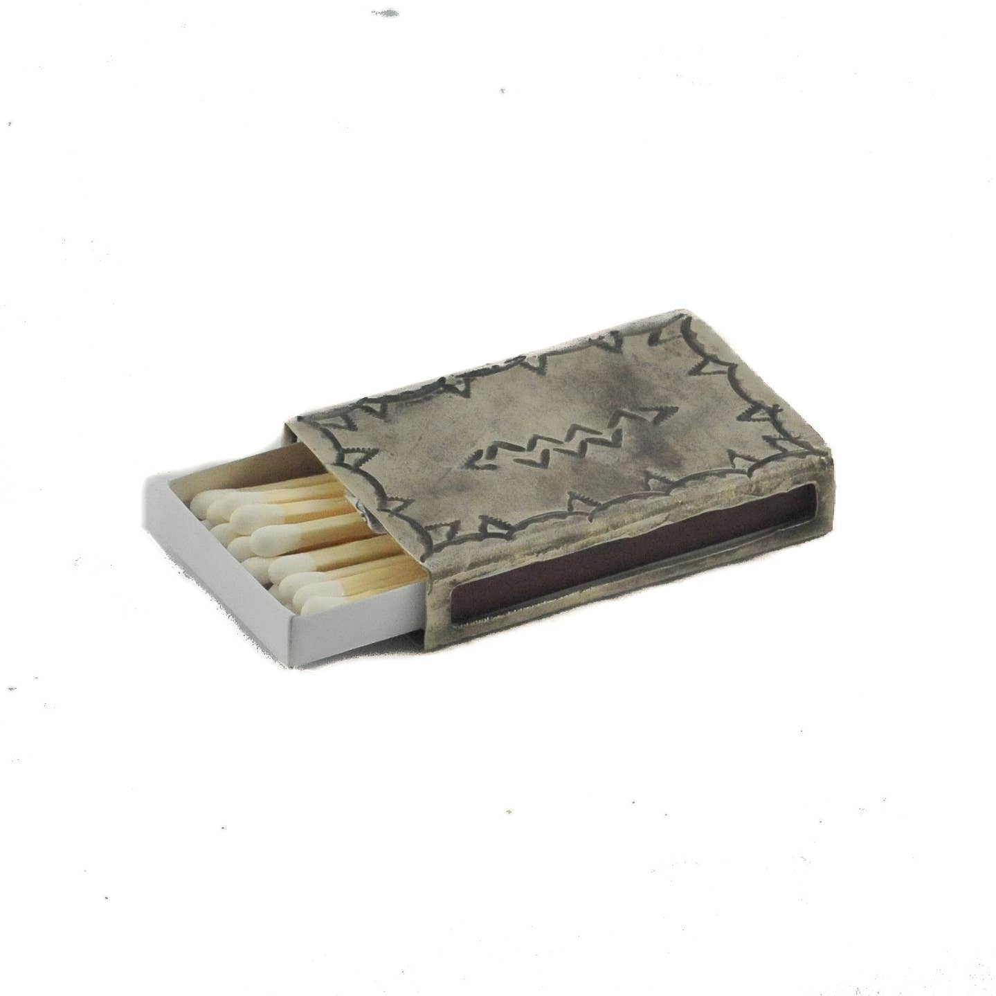 Matches in a decorative wooden box on a white background