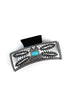 Silver hair clip with turquoise stone on a white background