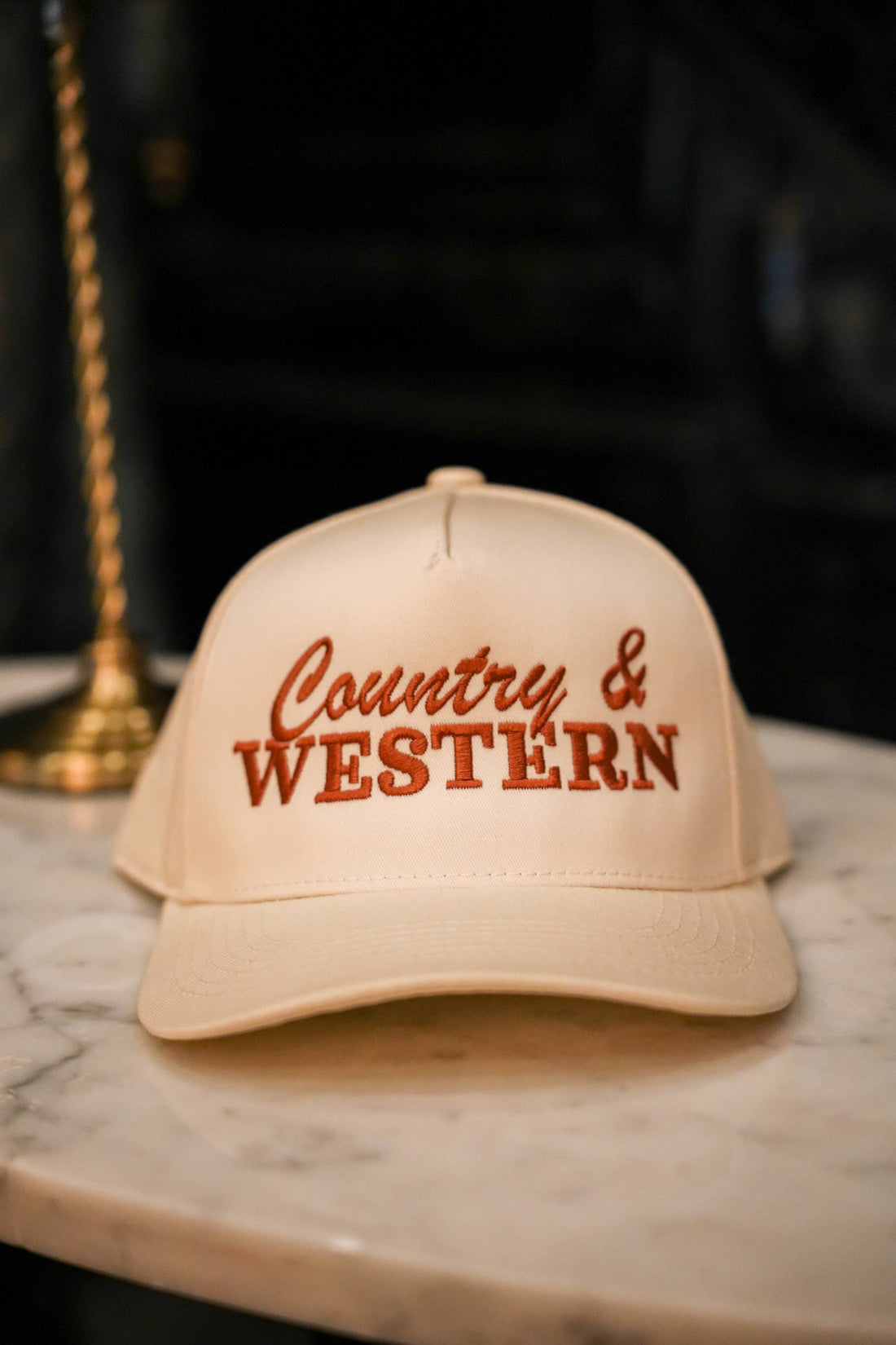 Beige cap with &