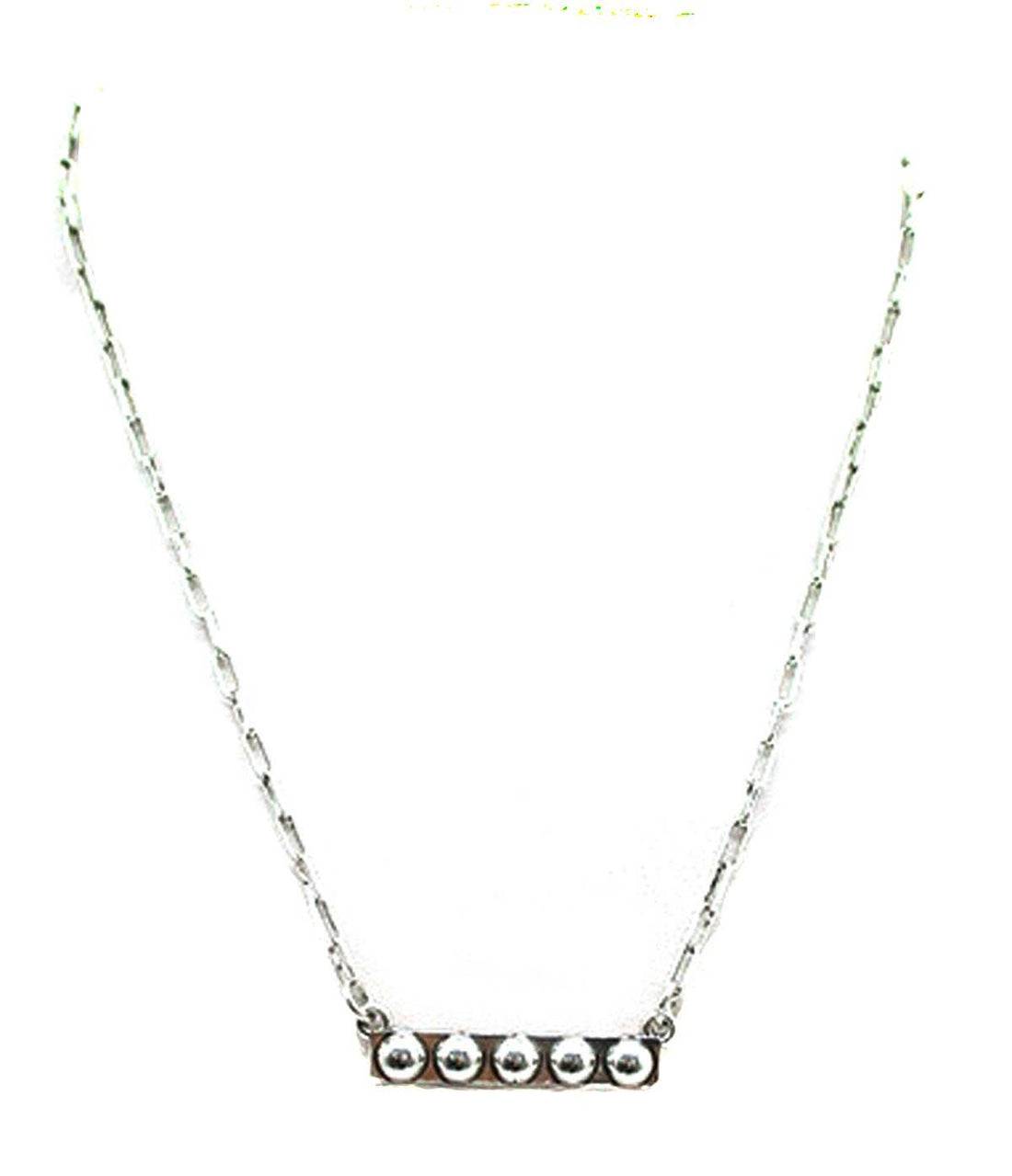 Silver necklace with a bar pendant on a white background