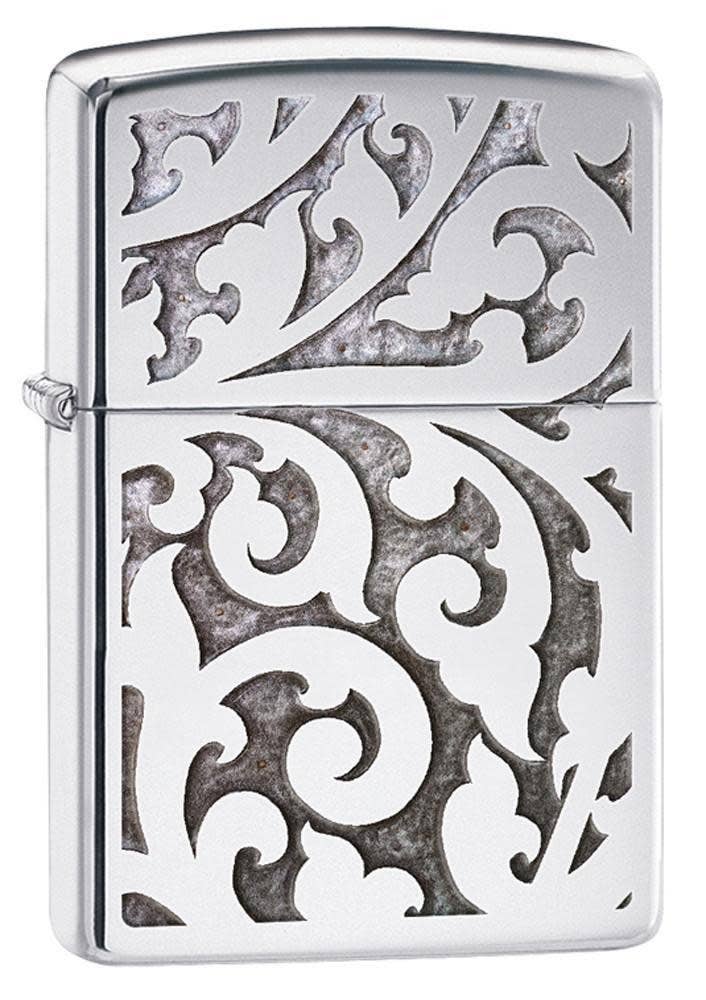 Decorative lighter with intricate patterns on a white background