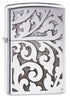 Decorative lighter with intricate patterns on a white background