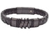 Black braided leather bracelet with metallic clasp on a white background