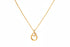 Gold necklace with a pendant on a brown card with text