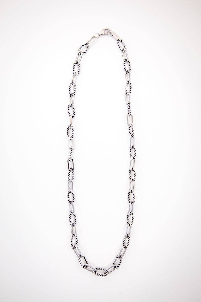 Silver chain necklace on a white background