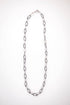 Silver chain necklace on a white background