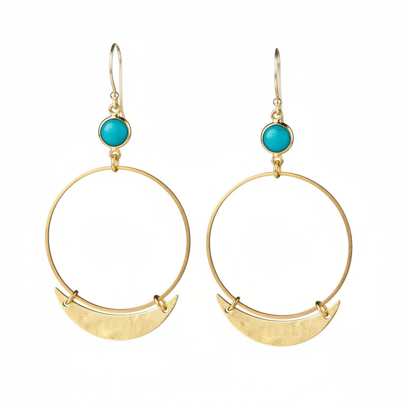 Gold hoop earrings with turquoise stones on a white background