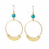 Gold hoop earrings with turquoise stones on a white background