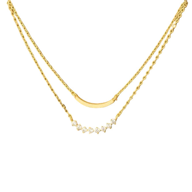Gold necklace on a white background