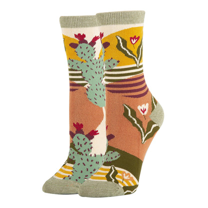 Colorful socks with cactus design on a white background