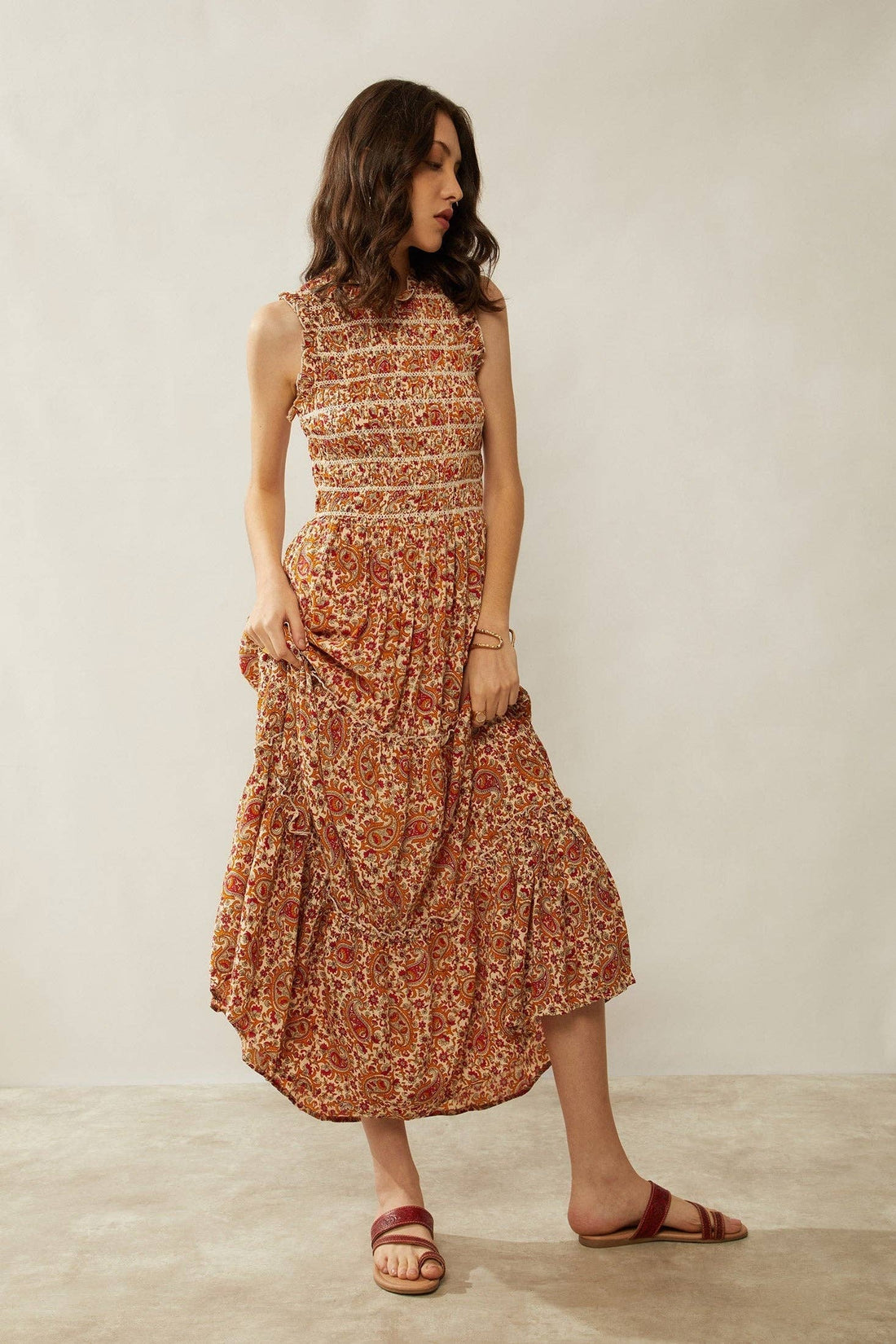 Western paisley midi dress with pleated bodice, ruffle trim, and warm desert-toned print