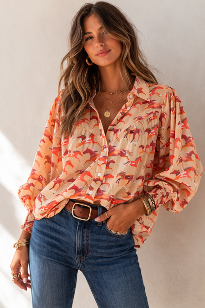 Women’s western horse print blouse in warm desert tones featuring button front, yoke detail, and relaxed fit styling