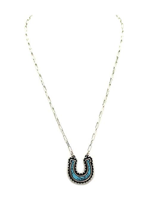 Necklace with a turquoise horseshoe pendant on a white background
