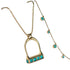 Gold necklace with turquoise stones on a white background