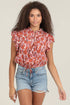 Women’s western pink floral printed blouse with ruffle sleeves, notch neckline, and front button detail