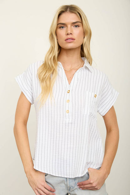 Striped shirt with collared neckline, short cuff sleeves, and half button front in a lightweight woven fabric