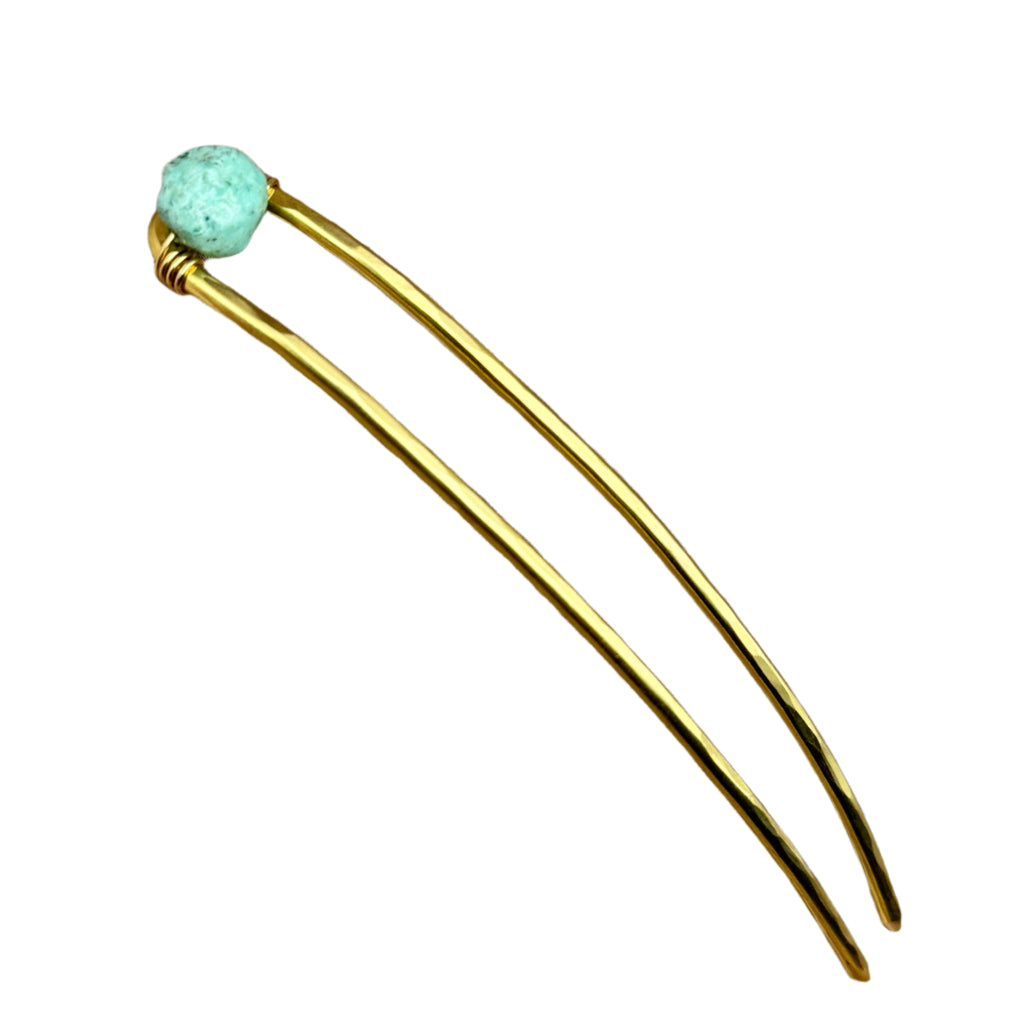 Handmade Turquoise Trail Hair Fork featuring a raw brass design with a natural turquoise nugget, perfect for securing updos with a Western touch.
